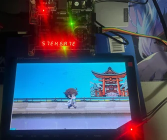 The game running on the FPGA setup, photographed in the project report (p. 27).